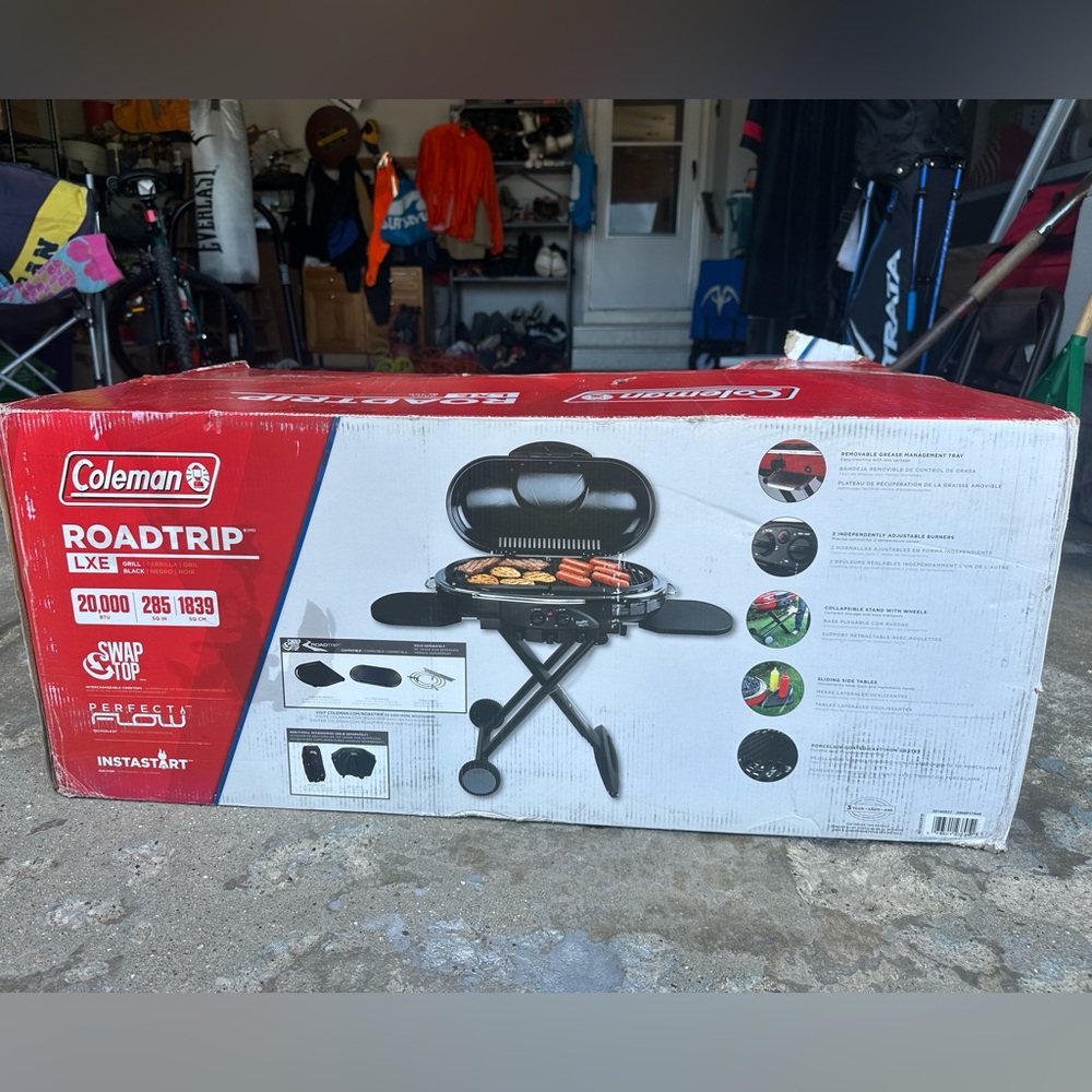 Coleman RoadTrip LXE Portable Grill brand new, never been used or opened
